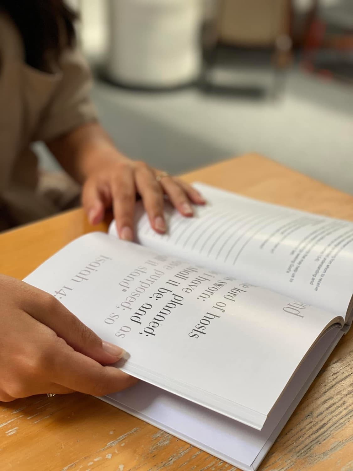 Daily Growth devotional open on a table, being read